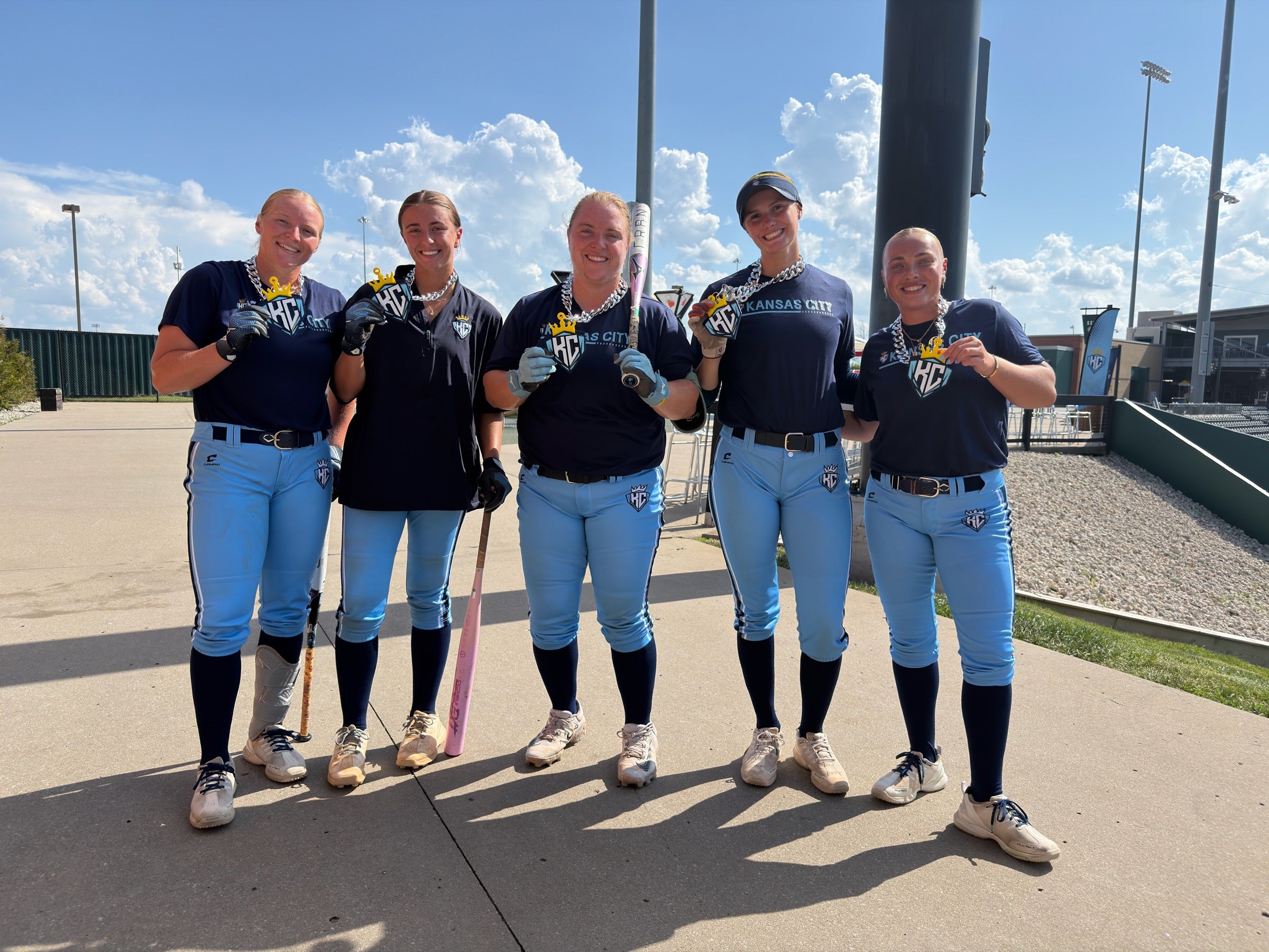 KC Diamonds players wearing Layered KC printed chains and crown keychains